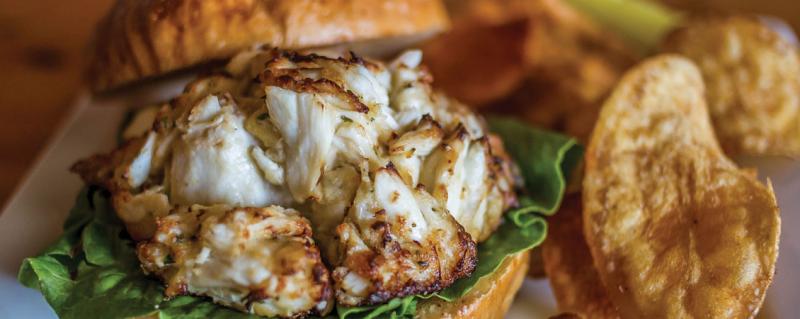 Though there's nothing like hot and spicy crabs piled on newspaper surrounded by pitchers of beer, the crab cake is waaayyy more portable and requires a lot less effort to consume. BOB YESBEK PHOTO